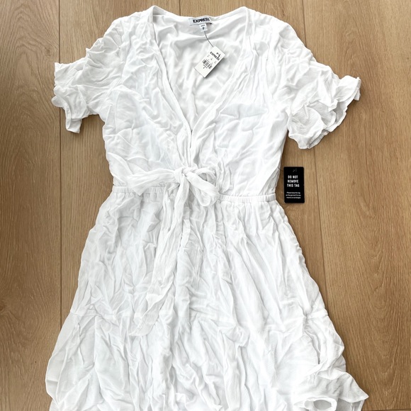 Express Dresses & Skirts - NWT express plunge ruffle dress white